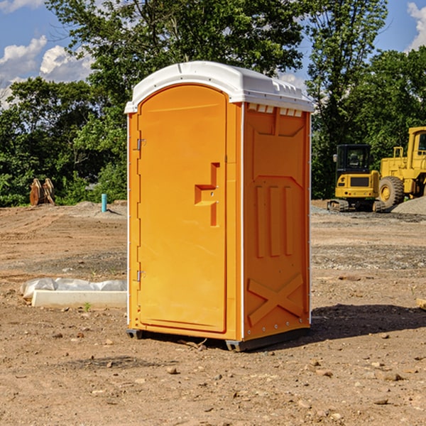 how often are the portable restrooms cleaned and serviced during a rental period in Sandy Point